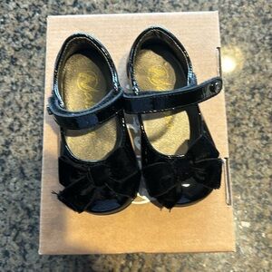 Black flats with velvet bow